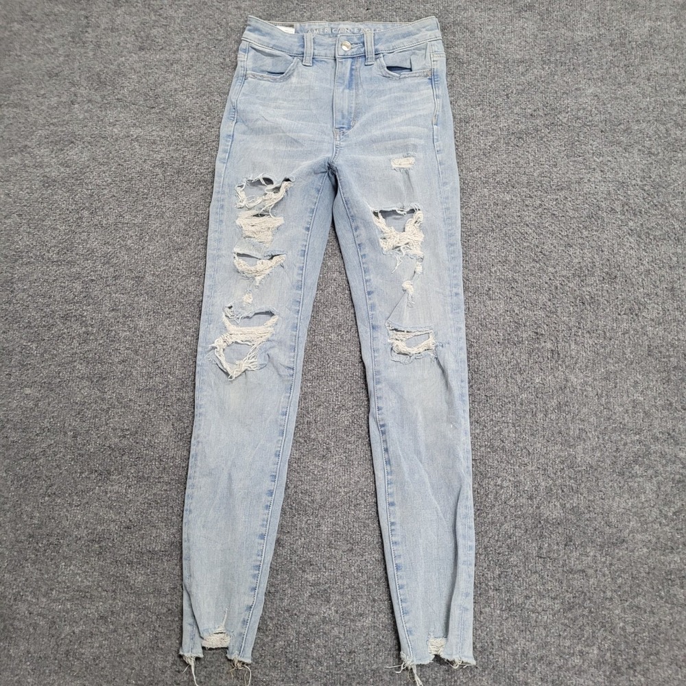 American Eagle Jeans Womens Size 0 Light Wash Skinny Distressed Raw Hem Stretch